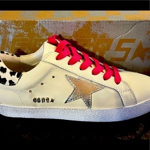 Golden Goose shoes received as gift, not right size, never worn,box included.